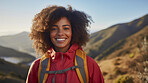 Happy african american woman hiking outdoors. Fitness hike and travel journey