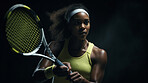 Action Portrait of woman training for tennis match. Confident and focused athlete