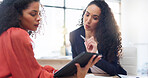 Teamwork, tablet and business women in office helping coworker with project. Coaching, collaboration and intern in training talking to mentor with touchscreen technology for learning in company.