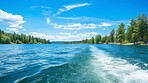 Point of view  shot of  boat trail on crystal clear lake. Vacation, summer, travel