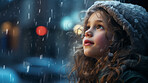 Toddler child cheerfully looking up at falling snow in winter or christmas season