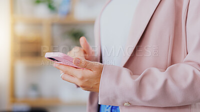 Buy stock photo Business, woman and hands typing on smartphone in office, online app or contact technology. Closeup of female worker texting on pink cellphone for networking, notification and mobile media connection