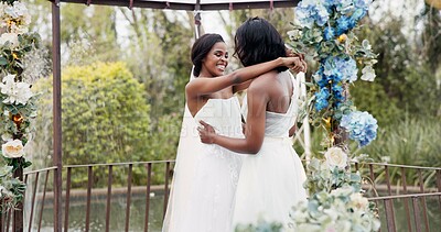Wedding, lesbian and women dancing outdoor together at ceremony for celebration, happiness and romance. Marriage, love and lgbtq people embracing and moving with smile in elegant dress in nature