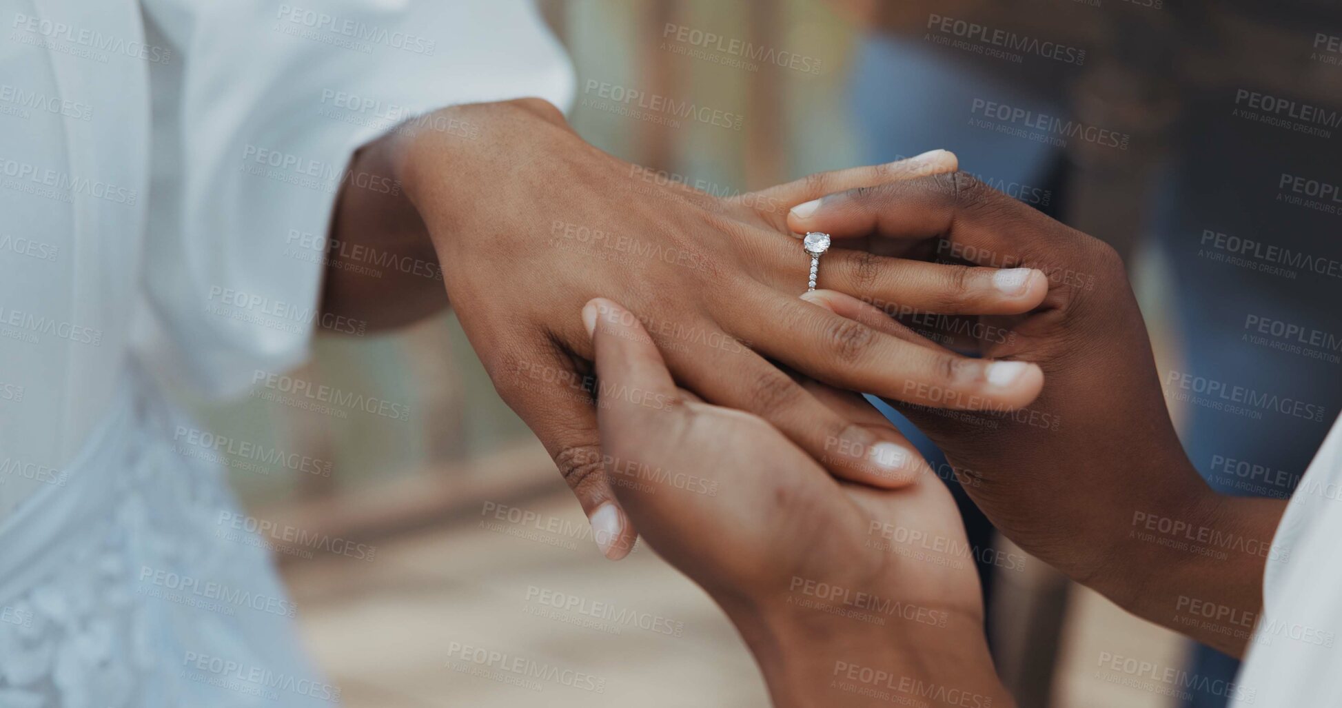 Buy stock photo Couple, holding hands and jewellery for wedding, commitment or marriage union or ceremony with closeup outdoor. People, man and woman getting married for love, celebration and support with ring bond