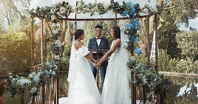 Women, lesbian wedding and ceremony outdoor with priest for love, celebration or together for commitment. Gay marriage, event and party with bride, black man or vows in nature, lgbtq couple or garden