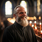 Portrait of senior priest smiling in church. Religion concept.