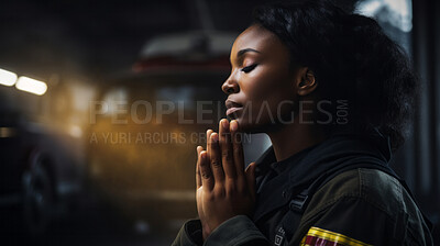 Firefighter praying. Safety, protection, faith and religion concept