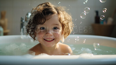 Smiling toddler bathes in bathtub with foam and bubbles. Happy baby bath time