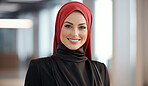 Portrait of professional muslim woman, office backdrop. Wearing hijab. Religion concept.