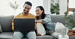 Couple, laptop and laugh on sofa in home for love, watch movies and streaming multimedia. Happy man, woman and talk about funny meme on computer, social media post and online shopping in living room