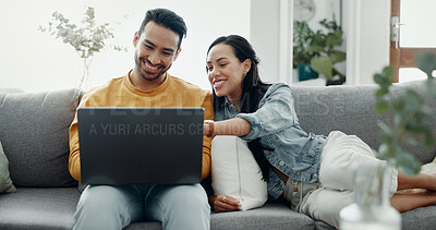 Buy stock photo Couple, laptop and laugh on sofa in home for love, watch movies and streaming multimedia. Happy man, woman and talk about funny meme on computer, social media post and online shopping in living room