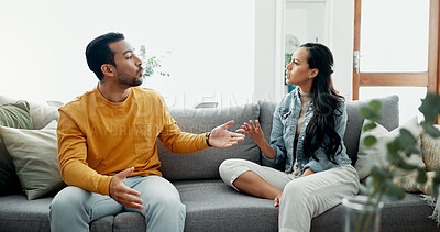 Buy stock photo Conflict, angry fight and frustrated couple on a couch with drama, argument and toxic relationship in a home. Unhappy, divorce and man with marriage problem with woman and stress in living room sofa