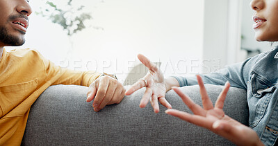 Buy stock photo Argument, hands and closeup of couple on a sofa in the living room for cheating, fight or toxic relationship. Conversation, discussion and zoom of man and woman talking for communication at home.