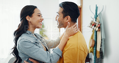 Buy stock photo Couple, happy and hug in home lounge with a smile, security and love in healthy relationship. Young man and woman together in an apartment for affection, forehead touch and communication with care