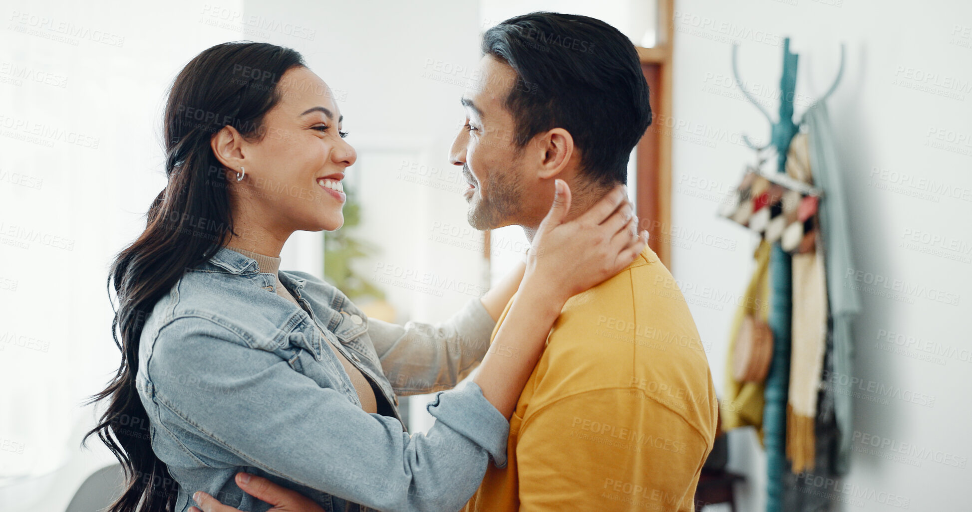 Buy stock photo Hug, love and couple in living room of new home for bonding, relationship and excited in house. Dating, real estate and happy man and woman embrace for commitment, trust and romance in apartment