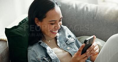Buy stock photo Woman, laugh and typing with phone on sofa, scroll social media or reading funny notification from home. Smartphone user, meme and search website, download digital app and mobile games in living room