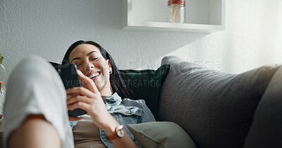 Happy woman, thinking and relax with smartphone on sofa, scroll social media and reading notification at home. Cellphone, smile and search connection, download digital app and contact in living room