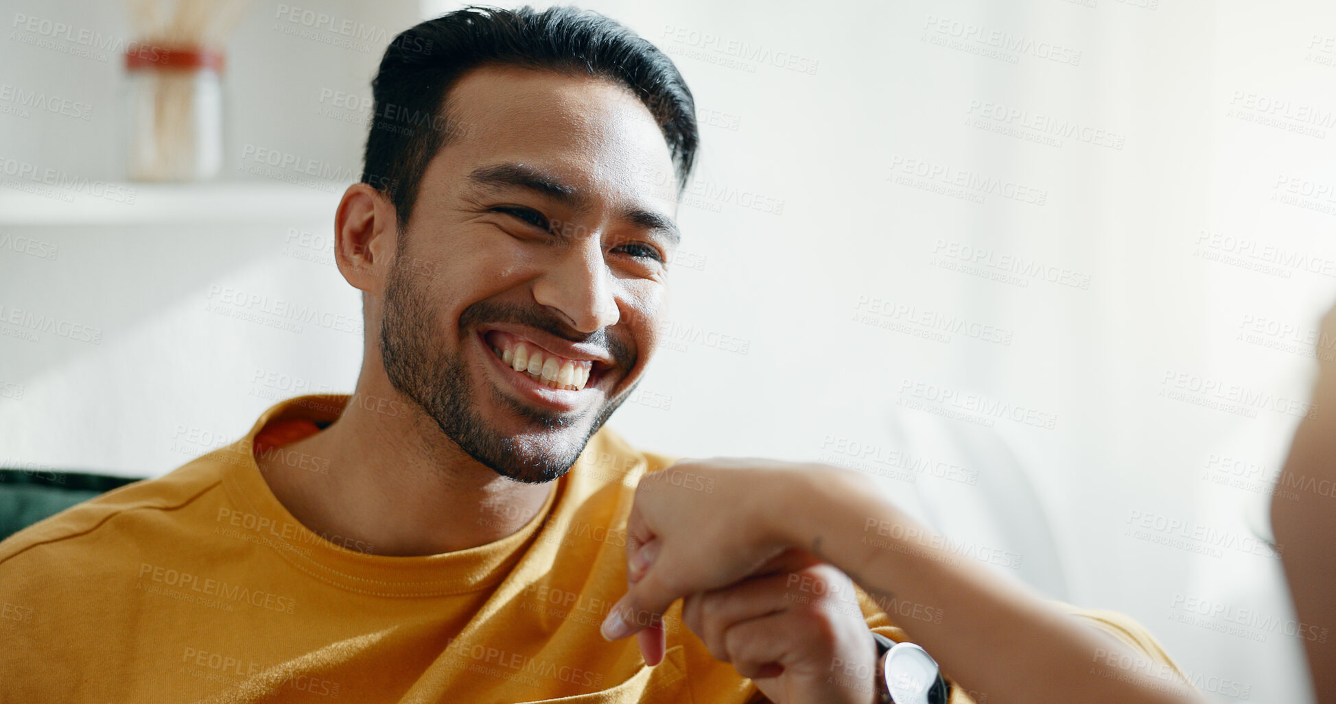 Buy stock photo Holding hands, love and happy couple on sofa, relax and bonding in romantic conversation in home. Smile, man and woman in living room with trust, support and respect in marriage together in apartment