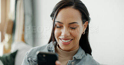 Buy stock photo Woman, smile and typing on smartphone in home, reading social media joke and chat notification of multimedia connection. Cellphone, laugh and search funny meme, download digital app and mobile games