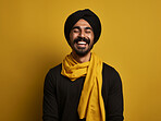 Happy religious man with traditional turban with scarf. Studio portrait. Religion concept.