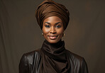 African American woman. Studio portrait. Wearing traditional attire. Religion concept.