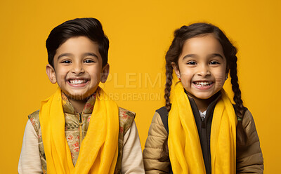 Buy stock photo Studio portrait of two cute hindu kids. Against yellow backdrop. religion concept.