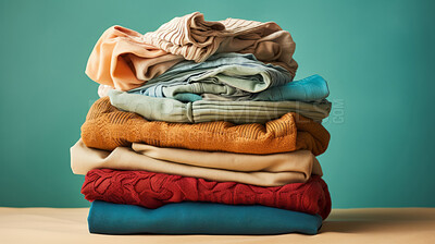 Buy stock photo Stack of colorful folded clothing items. Clean laundry copyspace background