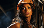 Editorial style portrait of woman construction worker. Women empowerment concept.