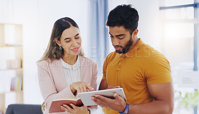 Buy stock photo Business man, woman or partner with tablet with notebook, talking and team work for planning strategy. Businessman, partnership and reading notes for goals, ideas or collaboration at startup office
