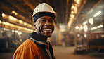 Happy, smiling construction industry professional wearing uniform in factory.