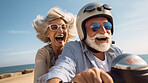 Happy retired senior couple on scooter. Fun travel explore activity