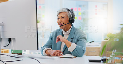 Consultant, senior woman and talking with technology at office for customer service at help desk call center. Sales, telemarketing and mature employee with headphones at work for crm with technical support.