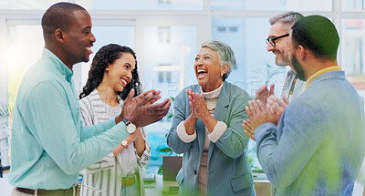 Creative people, meeting and applause in celebration for winning, team achievement or unity at the office. Group of happy employees clapping in success for teamwork, promotion or startup at workplace