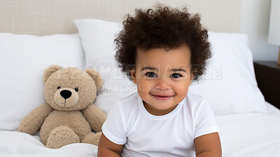 Buy stock photo Toddler smiling while sitting on bed with a toy. Portrait of a happy and cheerful baby