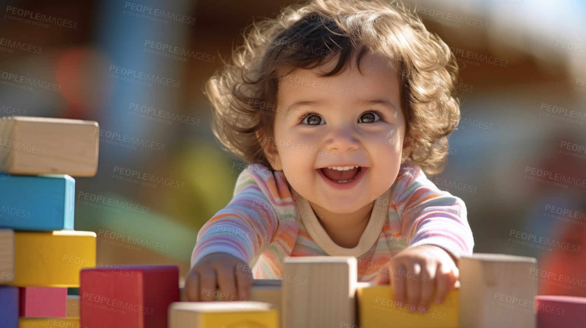 Buy stock photo Portrait of a happy toddler playing with building blocks at kindergarten or playroom.