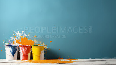 Opened paint buckets, Paint splashed against wall. Copy space. DIY construction concept.