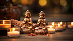 Close-up of buddha  statues and candles. Meditation, religion concept.