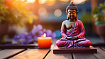 Close-up of  buddha with vibrant colour and candle. Meditation, religion concept.