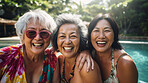 Senior friends in swimming pool. Active holiday fun, fitness and longevity