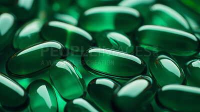 Green gel pills background. Health supplement and science medicine research concept