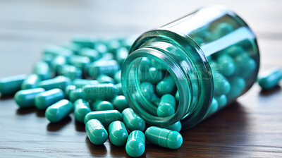 Green pills in glass container. Health supplement and science medicine research concept
