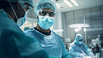 Surgeon or doctor in the operating hospital room -performing an operation