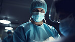 Surgeon or doctor in the operating hospital room -performing an operation