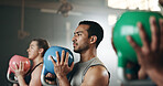 Gym, group fitness and kettlebell squat exercise for power, sports challenge and muscle. Serious asian man, bodybuilder and heavy weights for training in health club, workout class and strong friends