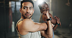 Men at gym together, stretching arms and muscle building strong body, balance and power in fitness. Commitment, motivation and focus, flexible bodybuilder in workout challenge with personal trainer.