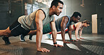 Gym, group fitness and push up exercise for power, sports challenge and muscle on ground. Serious asian man, bodybuilder and performance training on floor with friends, workout class or strong people