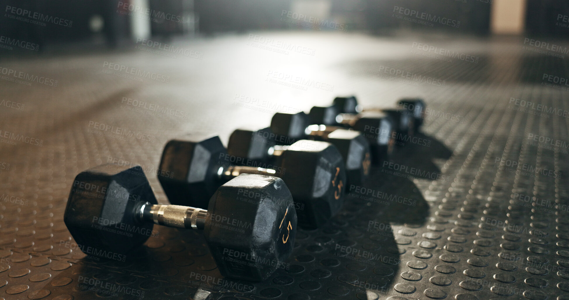 Buy stock photo Fitness, background and dumbbells in empty gym for exercise, bodybuilding workout and sports training. Closeup of heavy steel weights, equipment and iron on floor in wellness club for muscle power