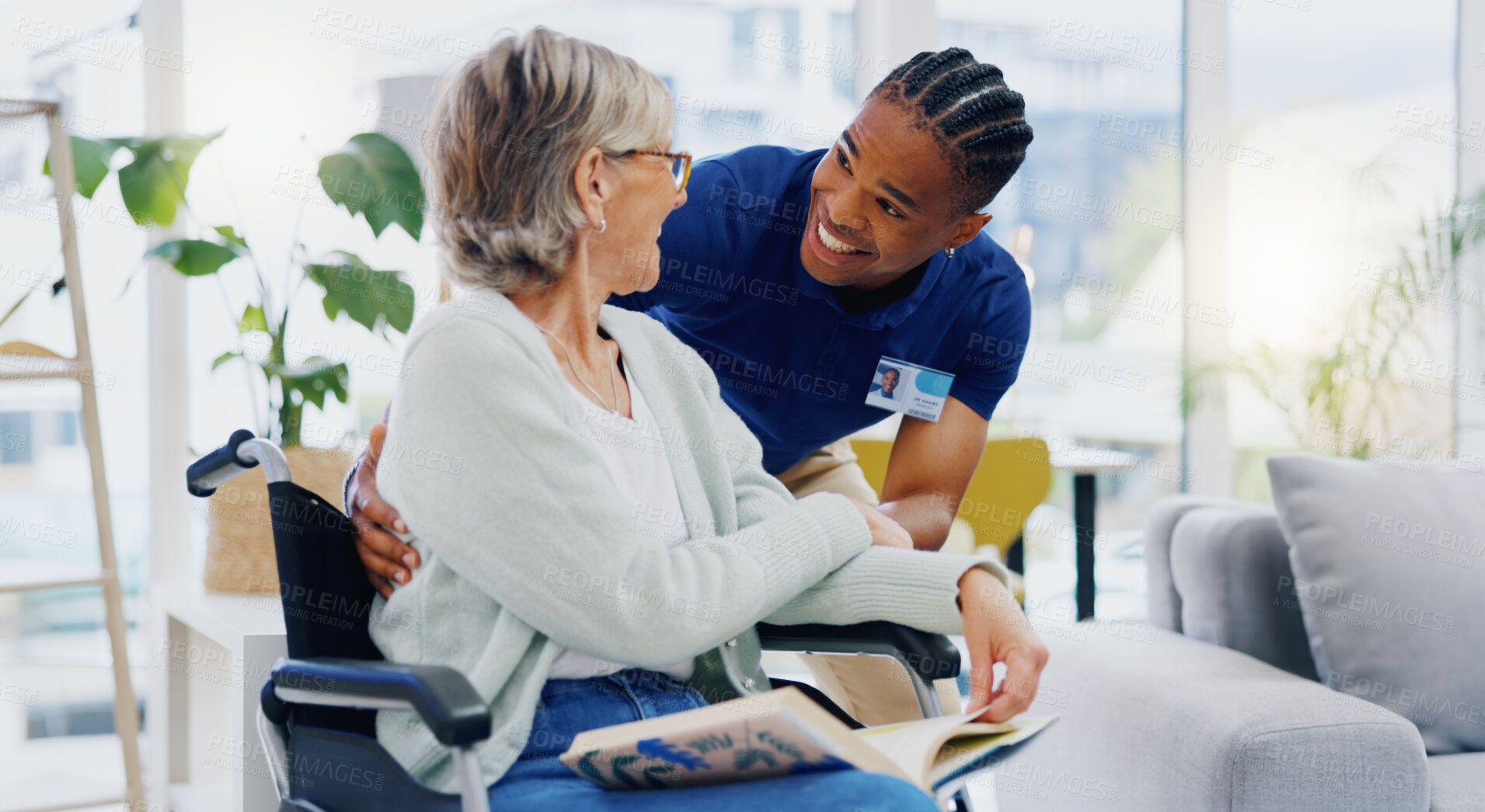 Buy stock photo Black man, caregiver or old woman in wheelchair talking or speaking in homecare rehabilitation together. Medical healthcare advice or male nurse nursing or helping elderly patient with disability