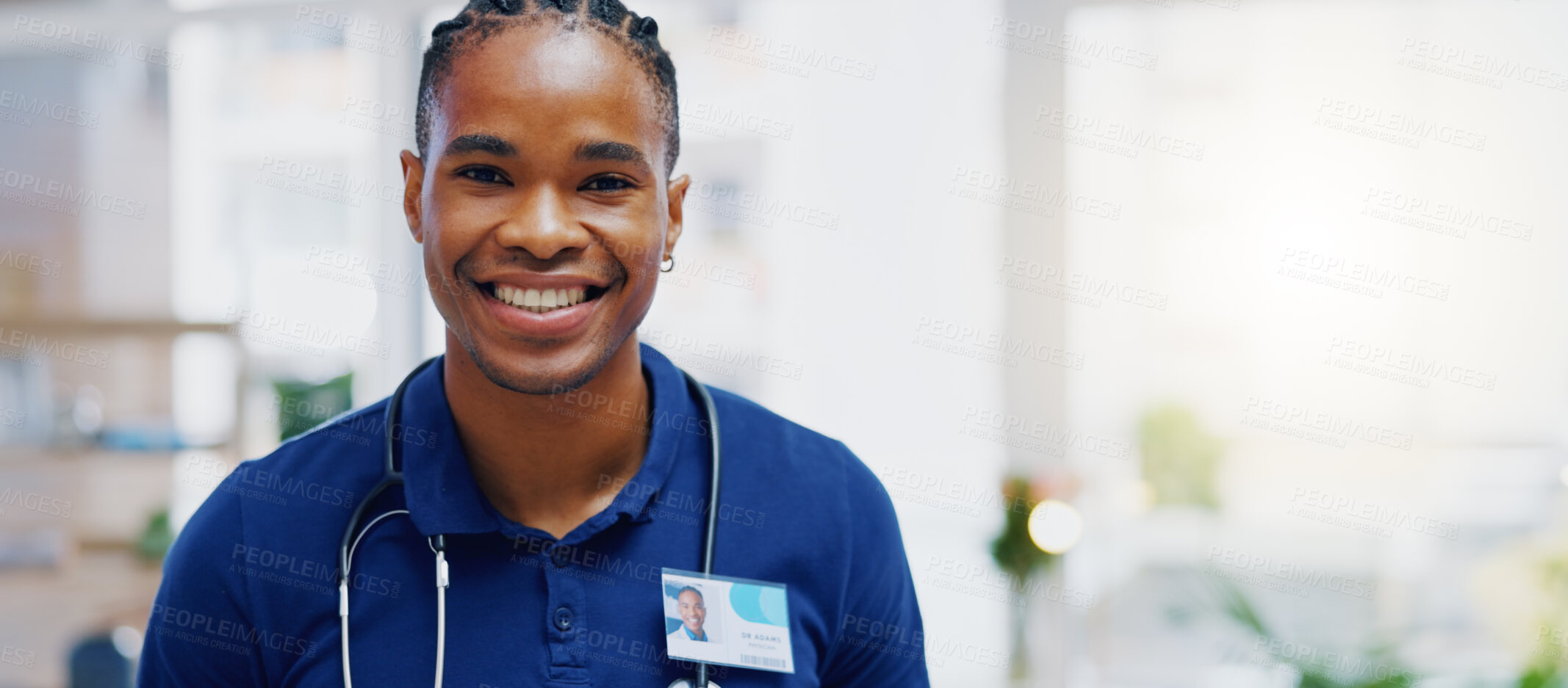 Buy stock photo Black man, doctor and smile on face in clinic for healthcare services, excited or happy for job. African medic, male nurse and happiness in portrait for wellness service, medical career or workplace