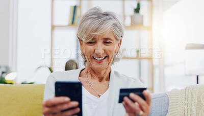 Happy senior woman, online shopping and delivery on phone, credit card and signature in logistics for package at home. Excited elderly female in ecommerce, shipping transaction or parcel for purchase